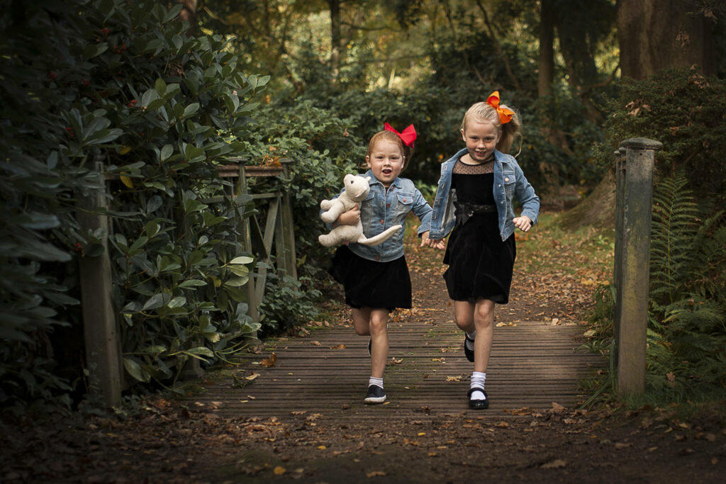 Child and Family Photographer in Surrey_girls enjoying a natural family photoshoot