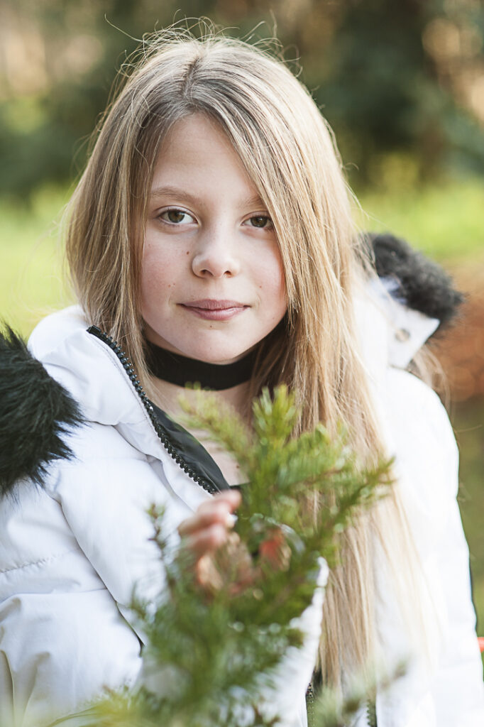 Girl standing in soft light