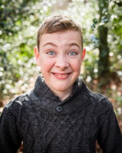 Boy misbehaving on a family photoshoot