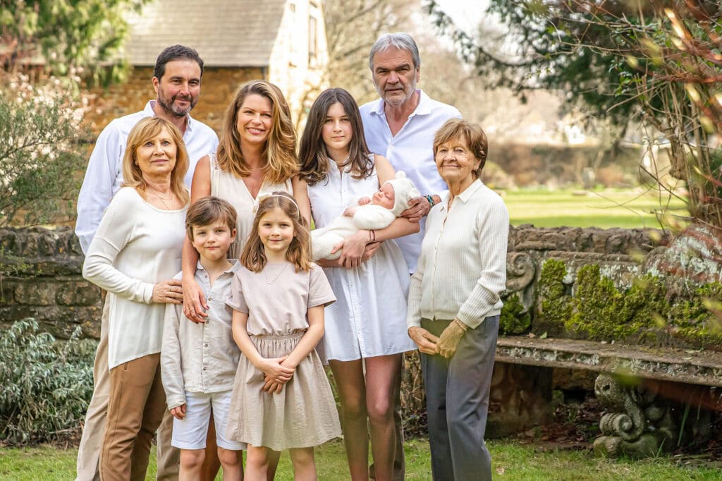 Gorgeous family smiling with the grandparents and the great grandparents. The importance of having Grandparents in your family Photography Jo Robbens photography