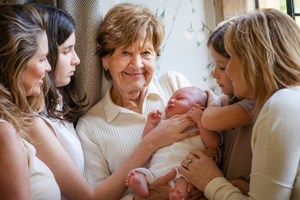 The great grandparent surrounded by her legacy. The importance of having Grandparents in your family Photography Jo Robbens photography